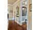 Bright hallway with hardwood floors and ornate mirrors at 12 John St # Includes 8 & 10, Charleston, SC 29403