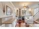Kitchen with granite countertops, white cabinets, and wood burning stove at 12 John St # Includes 8 & 10, Charleston, SC 29403