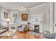 Living room with hardwood floors, fireplace and comfy seating at 12 John St # Includes 8 & 10, Charleston, SC 29403
