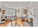 Spacious living room with hardwood floors, fireplace and large windows at 12 John St # Includes 8 & 10, Charleston, SC 29403