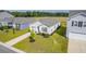 Aerial view of a charming house with a driveway and landscaped yard at 120 Clear Tide Dr, Summerville, SC 29486