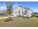 Charming new home with white siding, landscaping, and a spacious driveway at 120 Clear Tide Dr, Summerville, SC 29486