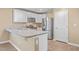 Modern kitchen with stainless steel appliances and white cabinets at 120 Clear Tide Dr, Summerville, SC 29486