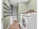 Laundry room with washer, dryer and shelving at 120 Clear Tide Dr, Summerville, SC 29486