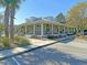 One-story home with a wrap-around porch and metal roof at 121 Etiwan Pointe Dr, Mount Pleasant, SC 29464