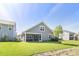 Gray house with screened porch and green lawn at 130 Brant Dr, Summerville, SC 29483