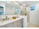 Modern bathroom with double vanity and a glass shower at 1349 Coosaw Dr, Charleston, SC 29407