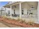 Spacious front porch with seating, ceiling fans, and a hammock at 144 Clear Bend Ln, Summerville, SC 29486