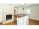 Living room with brick fireplace and hardwood floors at 1713 Mcleod Ave, Charleston, SC 29412