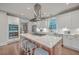 Spacious kitchen featuring white cabinets, stainless steel appliances, and a large island at 1935 Chestnut Oak Ln, Charleston, SC 29414