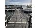 Wooden walkway with metal railings over the water at 2 Mcdonough Rd # B-19, Folly Beach, SC 29439