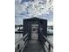 Wooden walkway leads to gated entrance of Mariner's Cay at 2 Mcdonough Rd # B-19, Folly Beach, SC 29439