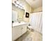 Clean bathroom with white vanity, toilet, and shower at 202 Summer View Rd, Summerville, SC 29483