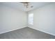 Spacious bedroom with grey carpet, ceiling fan, and large window at 217 Moon Shadow Ln, Summerville, SC 29485