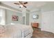 Bright bedroom with king-size bed and wood floors at 289 Whirlaway Dr, Moncks Corner, SC 29461