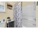 Bathroom with a shower/tub combo and marble shower curtain at 318 Parish Parc Dr, Summerville, SC 29485