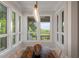 Bright dining area with rustic wooden table and woven chairs at 3518 Shipwatch Rd # Share E, Kiawah Island, SC 29455