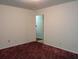 Simple bedroom with carpet and neutral walls at 7660 Crossgate Blvd, North Charleston, SC 29420