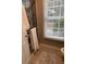 Bathroom with a shower, a window, and neutral-colored tile at 9049 Delancey Cir, North Charleston, SC 29406