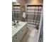 Bathroom with shower/tub, white vanity, and hexagon tile floor at 9049 Delancey Cir, North Charleston, SC 29406