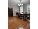 Formal dining room with hardwood floors and a wood table at 9049 Delancey Cir, North Charleston, SC 29406