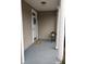 Front porch with a door, a small table, and a welcome mat at 9049 Delancey Cir, North Charleston, SC 29406