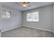 Simple bedroom with grey carpet and neutral walls at 114 Farrell St, Moncks Corner, SC 29461