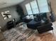 Spacious living room with sectional sofa and large rug at 158 Emerald Isle Dr, Moncks Corner, SC 29461