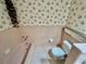 Pink bathroom with vintage tile and bathtub at 208 Howard St, Varnville, SC 29944