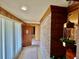 Inviting entryway with brick wall and wood paneling at 208 Howard St, Varnville, SC 29944