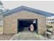 Attached garage with ample space for vehicles and storage at 208 Howard St, Varnville, SC 29944