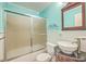 Charming bathroom with teal walls, vessel sink, and glass shower at 212 Glenda View, Ladson, SC 29456