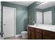 Bathroom boasts double vanity and dark wood cabinets at 261 Old Carolina Dr, Goose Creek, SC 29445