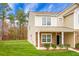 Two-story house with stone accents and a two-car garage at 261 Old Carolina Dr, Goose Creek, SC 29445