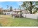 Charming one-story house with a porch and fenced yard at 2735 Constitution Ave, North Charleston, SC 29405