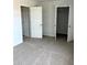 Simple bedroom with carpet, closet, and access to another room at 3005 Dalmore Dr, Ravenel, SC 29470