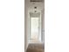 Bright hallway with access to bedrooms and carpet flooring at 3005 Dalmore Dr, Ravenel, SC 29470