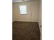 Bedroom with carpet, window, and door at 3930 Azalea Dr # W, North Charleston, SC 29405