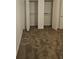 Bedroom with double closets and brown carpet at 3930 Azalea Dr # W, North Charleston, SC 29405
