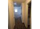 Hallway with doors to living room and bathroom at 3930 Azalea Dr # W, North Charleston, SC 29405