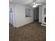 View of living room, kitchen pass-through and hallway at 3930 Azalea Dr # W, North Charleston, SC 29405