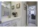 Bathroom with white vanity, quartz countertop, and shower at 435 Eva St, Moncks Corner, SC 29461