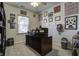 Home office with a desk, bookcase, and wall decor at 435 Eva St, Moncks Corner, SC 29461