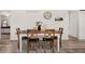 Charming dining room with wooden table and four chairs at 105 Whetstone, Moncks Corner, SC 29461