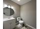 Small bathroom with toilet and sink at 144 Butterfly Ln, Moncks Corner, SC 29461