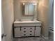 Bathroom with double vanity and a large mirror at 144 Butterfly Ln, Moncks Corner, SC 29461