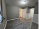 Simple bedroom with hardwood floors at 144 Butterfly Ln, Moncks Corner, SC 29461