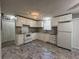 White kitchen with granite countertops at 144 Butterfly Ln, Moncks Corner, SC 29461