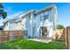 Private backyard with wooden fence, patio, and grassy area at 195 Pine Shadow Dr, Goose Creek, SC 29445