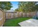 Fenced backyard with grassy area and concrete patio at 195 Pine Shadow Dr, Goose Creek, SC 29445